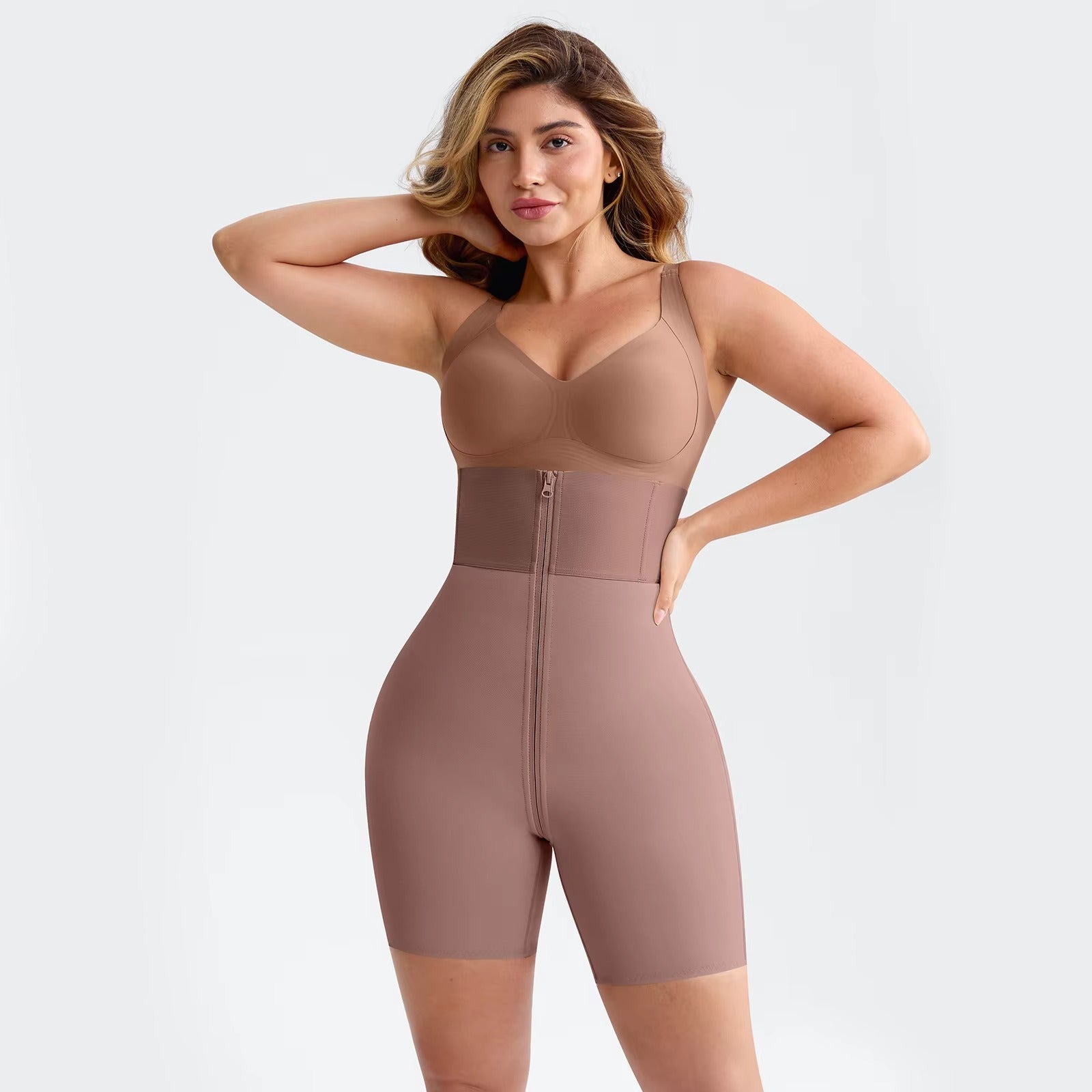 Turn heads from every angle! This premium high-waisted bodysuit features adjustable spaghetti straps, a secure hook-and-eye back closure, and targeted shaping that smooths your waist, hips, and thighs while lifting and rounding the booty for a natural, perky look. The ultra-soft, breathable fabric delivers firm yet comfortable control and stays completely invisible under any outfit. Perfect for everyday confidence or that special-occasion wow factor!

